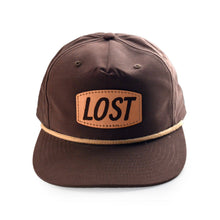 Load image into Gallery viewer, Brown cap with 'LOST' patch on a white background

