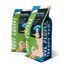 Load image into Gallery viewer, Two coffee bags with colorful designs and text on a white background
